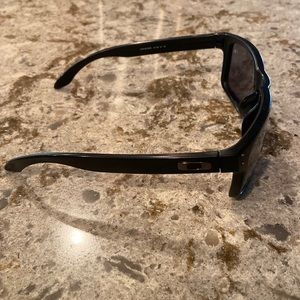 Oakley Holbrooks with a glass sleeve and two cases